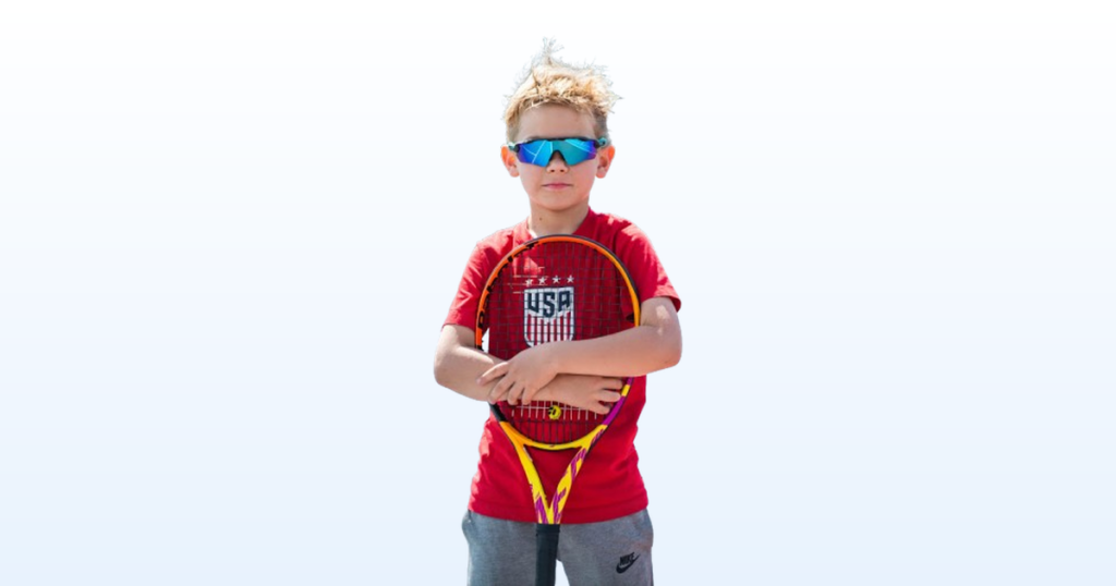 Alex The Tennis Pro holding a racket, on a light blue gradient background