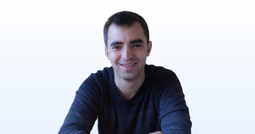 Eric Rosen portrait on a light blue gradient background